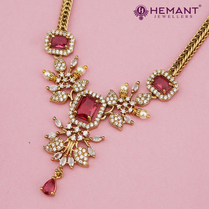 Antique Gold Floral Necklace Set with Ruby Square Stones & CZ Leaf Motifs – 1553