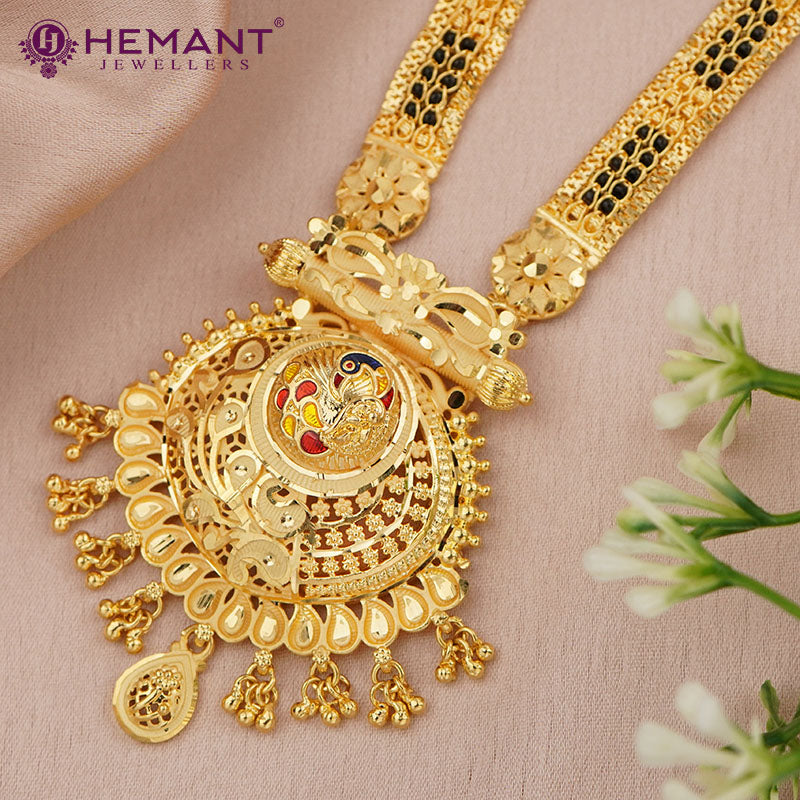Forming Gold 32" Mangalsutra with Floral & Peacock Pendant with a tint of Meena Work