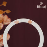 Rose Gold Tone Four-Petal Floral Stud Earrings with Sparkling White Stones - 5567